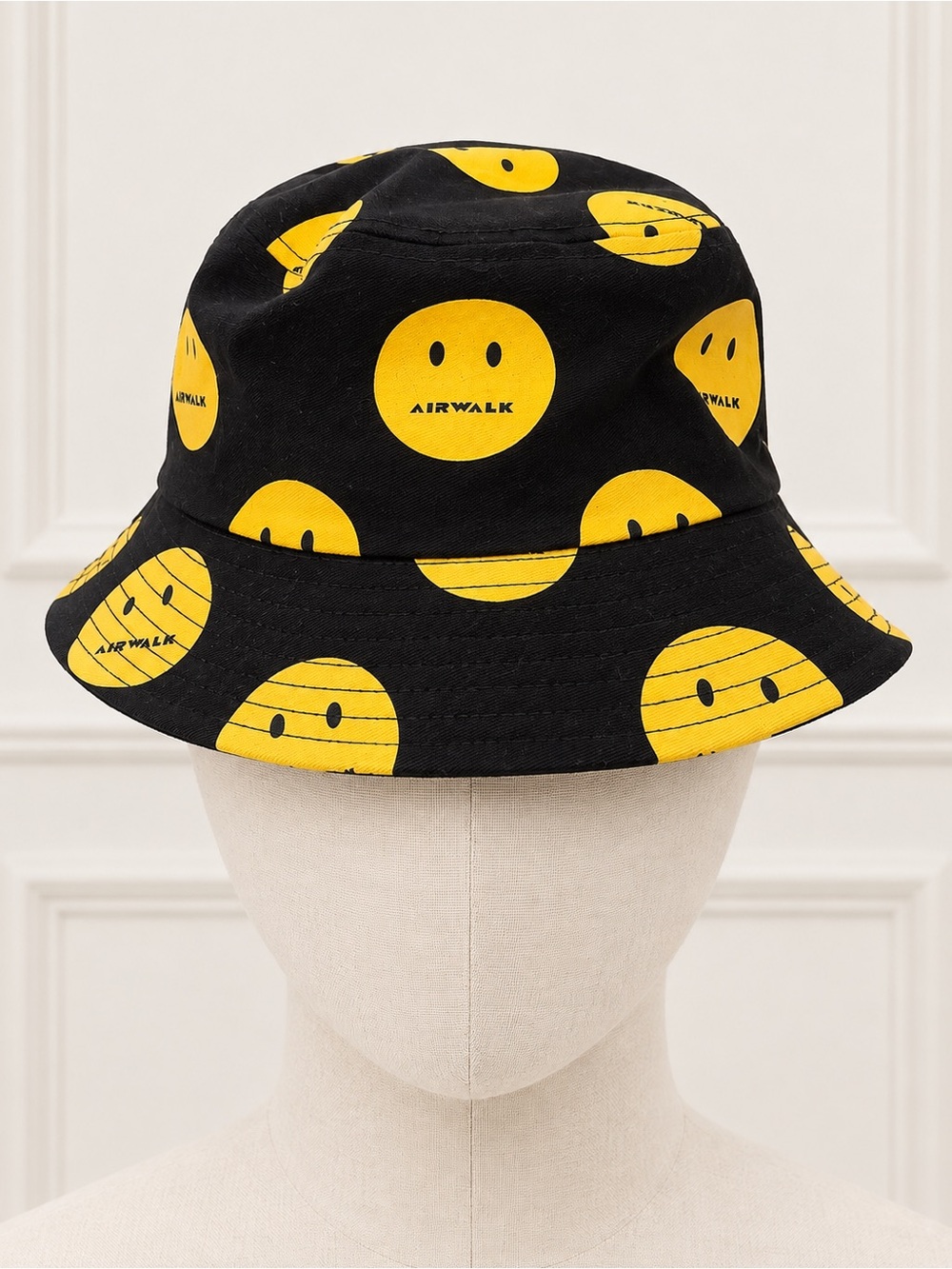 Airwalk Black Bucket Hat with Yellow Smiley Pattern